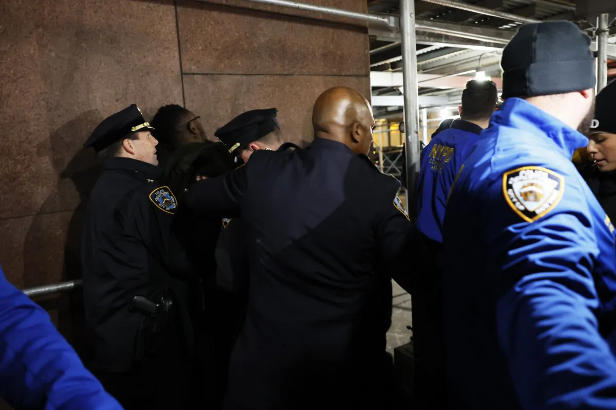 NYPD make an arrest as people march calling on Israel to stop its Rafah invasion in Gaza in New York on Feb. 12, 2024. (Michael M. Santiago/Getty Images)