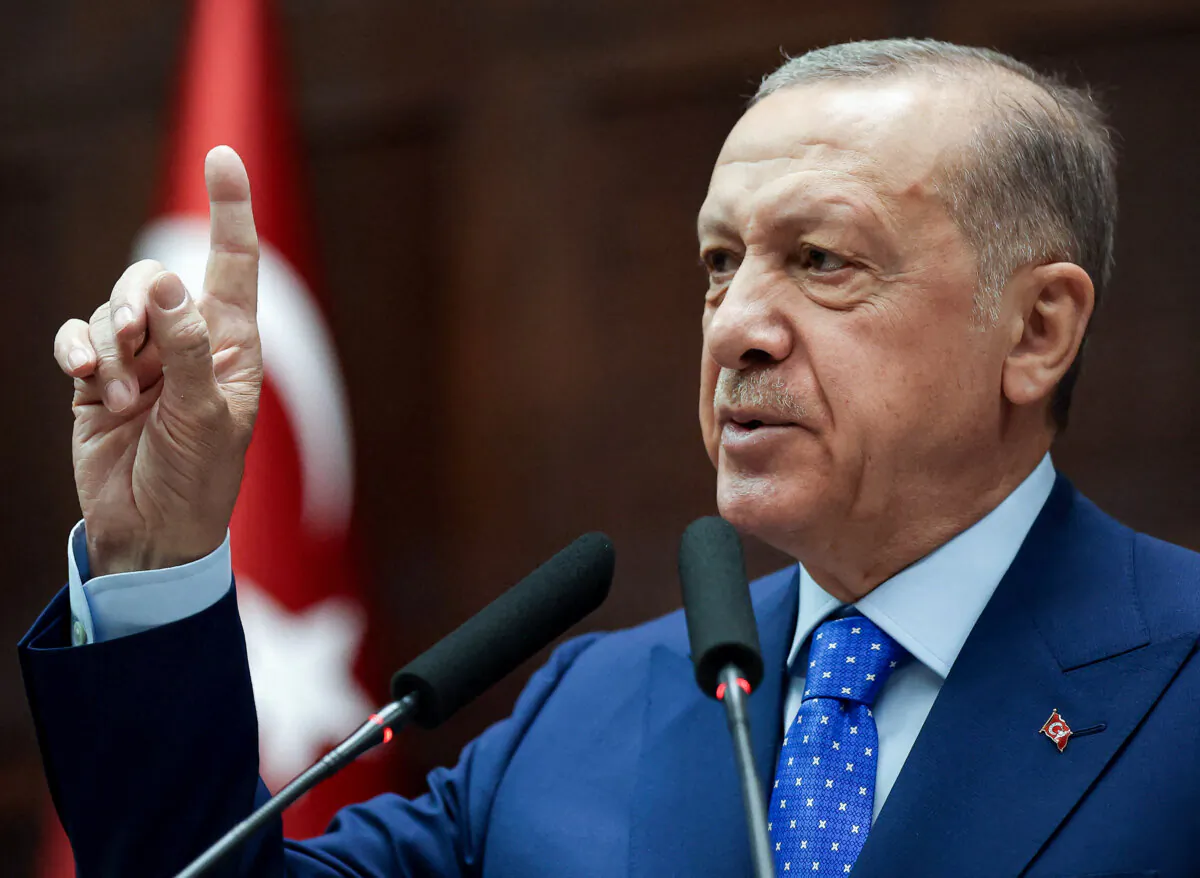 Turkey's President and leader of the Justice and Development (AK) Party Recep Tayyip Erdogan gestures as he delivers a speech during his party's group meeting at the Turkish Grand National Assembly (TGNA) in Ankara, Turkey, on May 18, 2022. (Adem Altan/AFP via Getty Images)