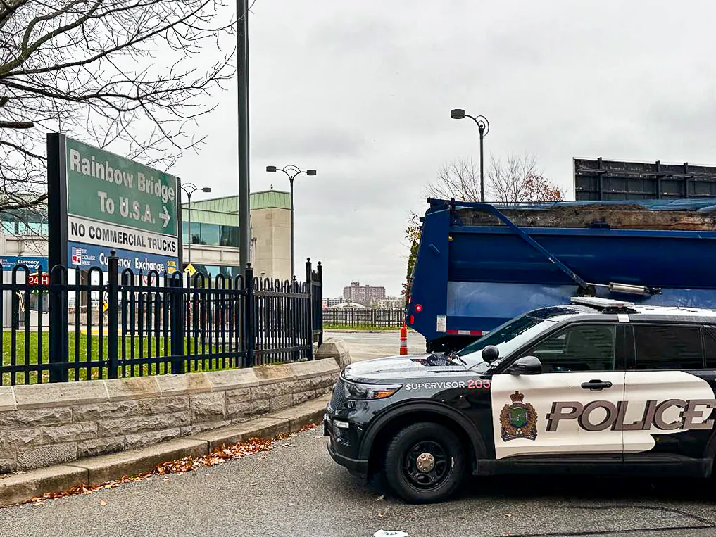 A Canadian police car is seen near the Rainbow Bridge border crossing into the United States in Niagara Falls, Ont., on Nov. 22, 2023. (Usman Khan/AFP via Getty Images)