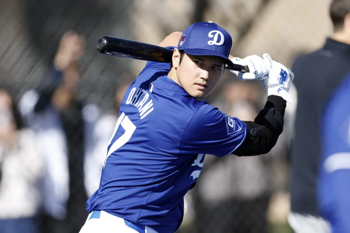 Shohei Ohtani (17) of the Los Angeles Dodgers swings the bat during workouts at Camelback Ranch in Glendale, Ariz., on Feb. 14, 2024. (Chris Coduto/Getty Images)