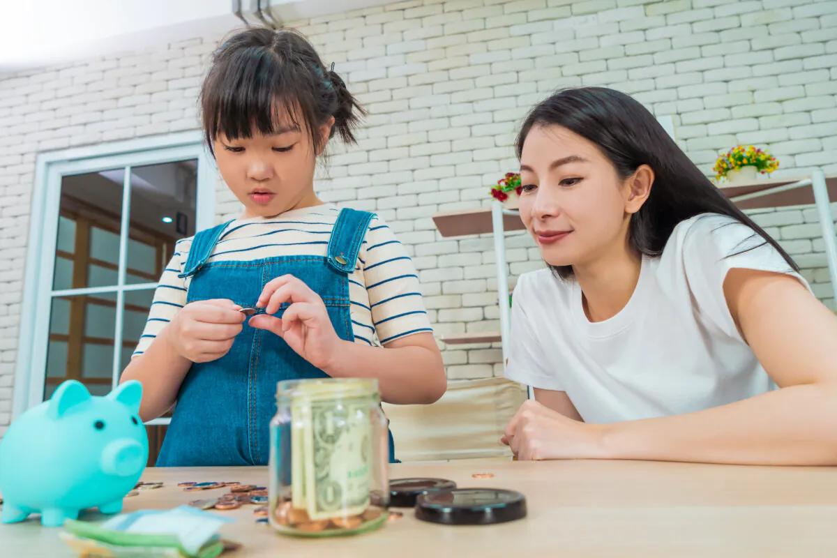 The goal of parenting is to help children to grow wings to eventually fly away. Building financial confidence in your children's lives is one important way that you can prepare them for the flight. (Anutr Yossundara/Shutterstock)