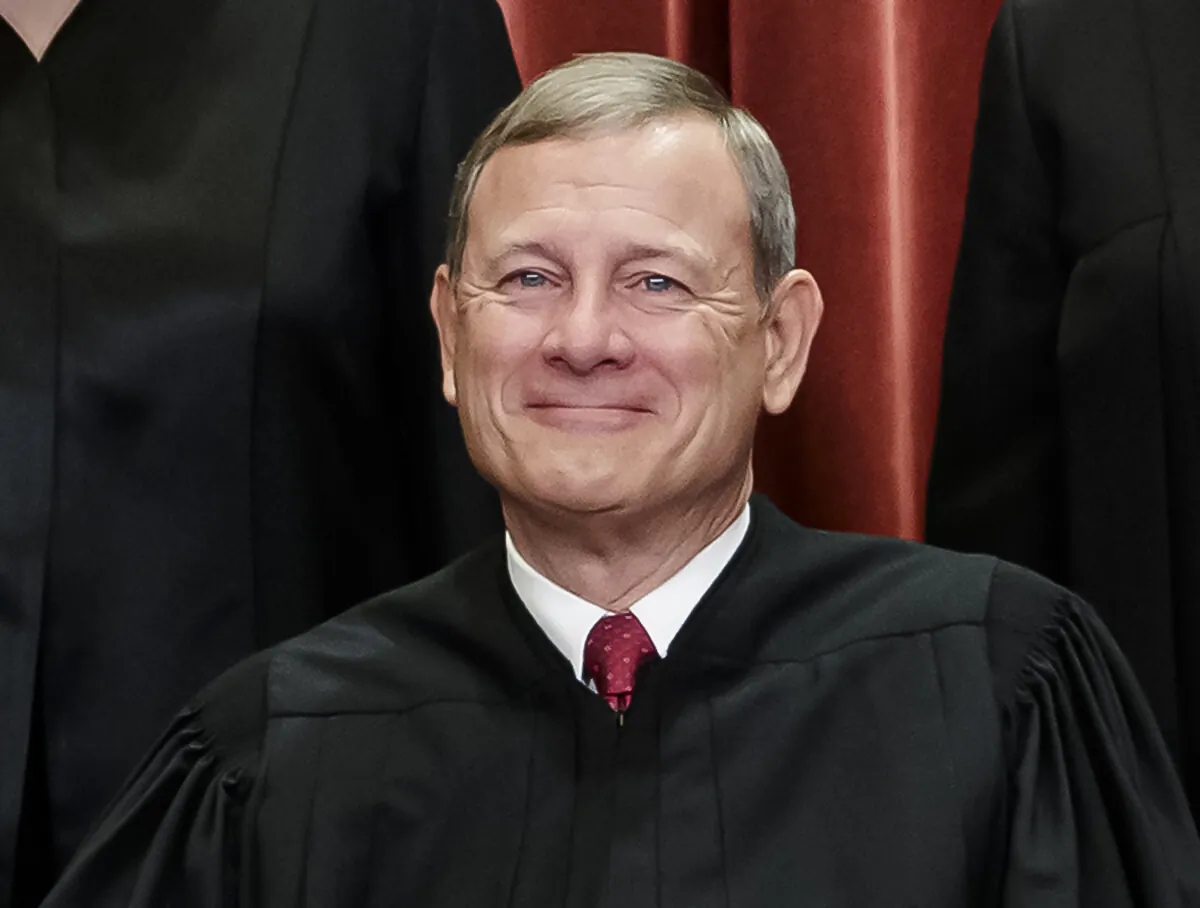 Chief Justice of the United States John G. Roberts, as he sits with fellow Supreme Court justices for a group portrait at the Supreme Court Building in Washington, on Nov. 30, 2018. (J. Scott Applewhite, File/AP Photo)