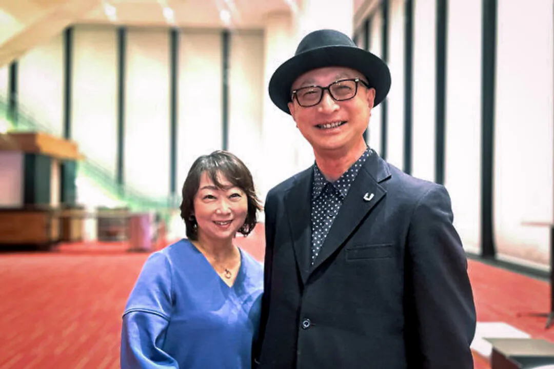 Tomonori Yamada and his wife at the Shen Yun Performing Arts performance at Sapporo Cultural Arts Theater Hitaru on Feb. 6, 2024. (Niu Bin/The Epoch Times)