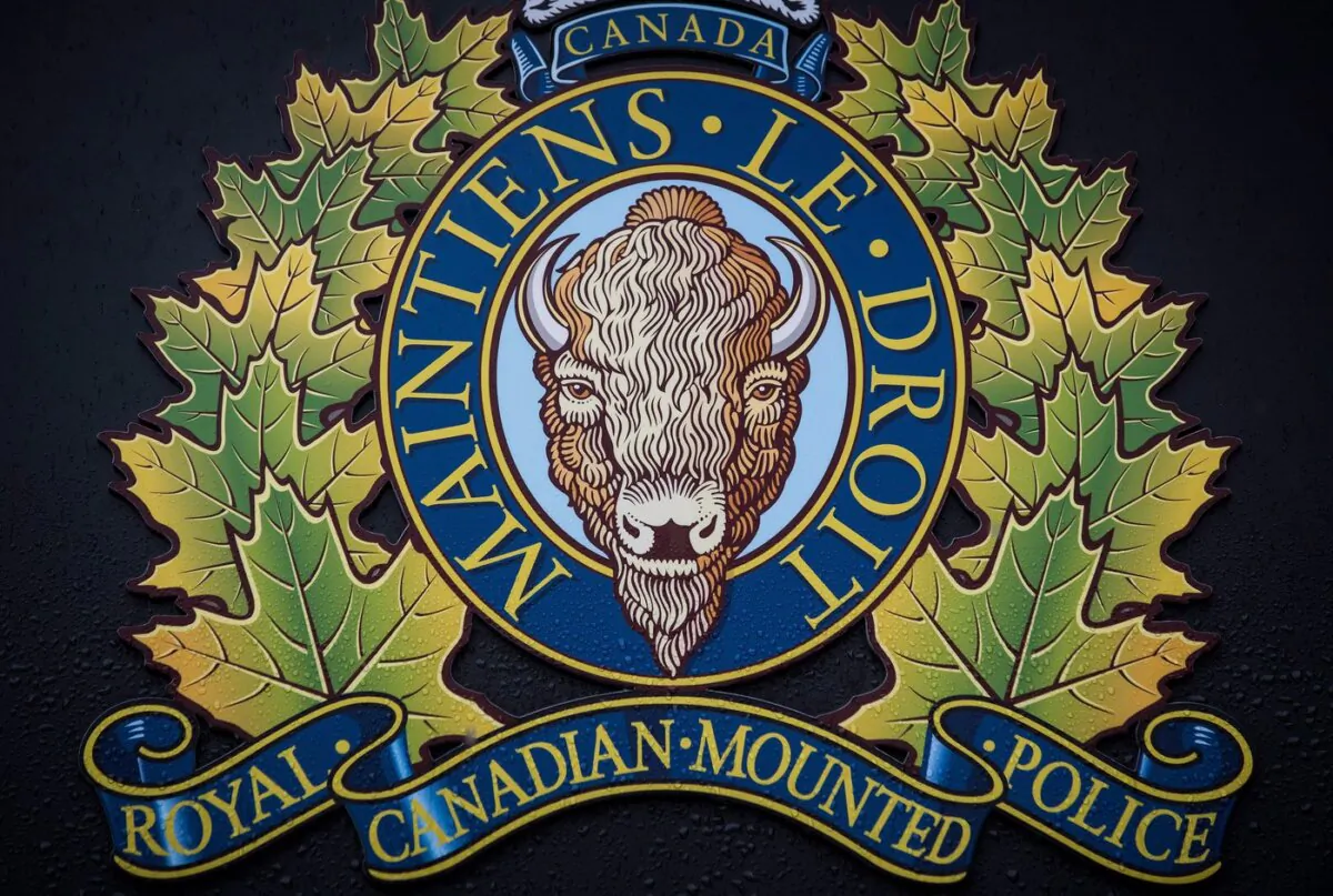 The RCMP logo is seen outside Royal Canadian Mounted Police "E" Division Headquarters, in Surrey, B.C., on April 13, 2018. (The Canadian Press/Darryl Dyck)