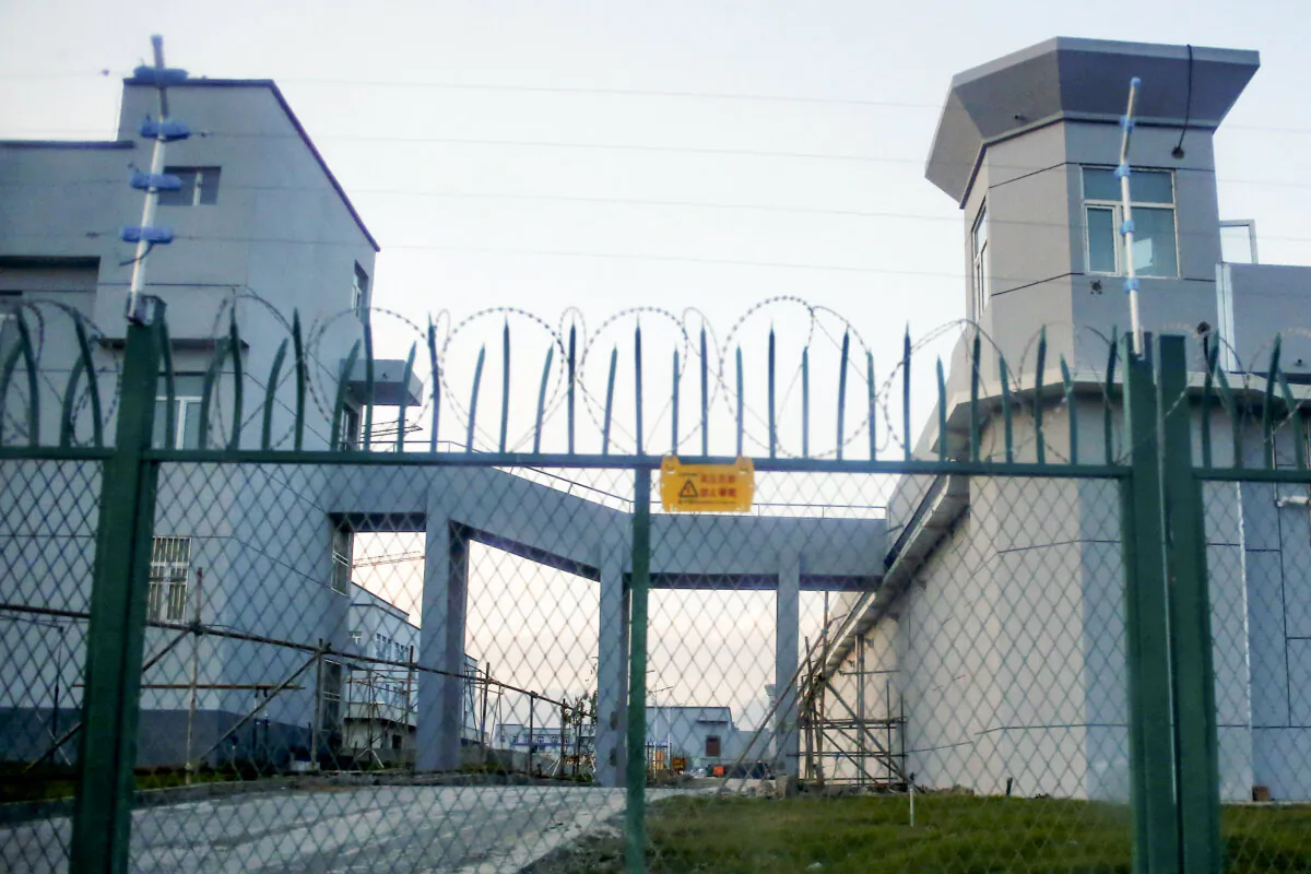 A perimeter fence is seen around what is officially known as a vocational skills education centre in Dabancheng in the Xinjiang Uyghur region, China, on Sept. 4, 2018. (Thomas Peter/Reuters)