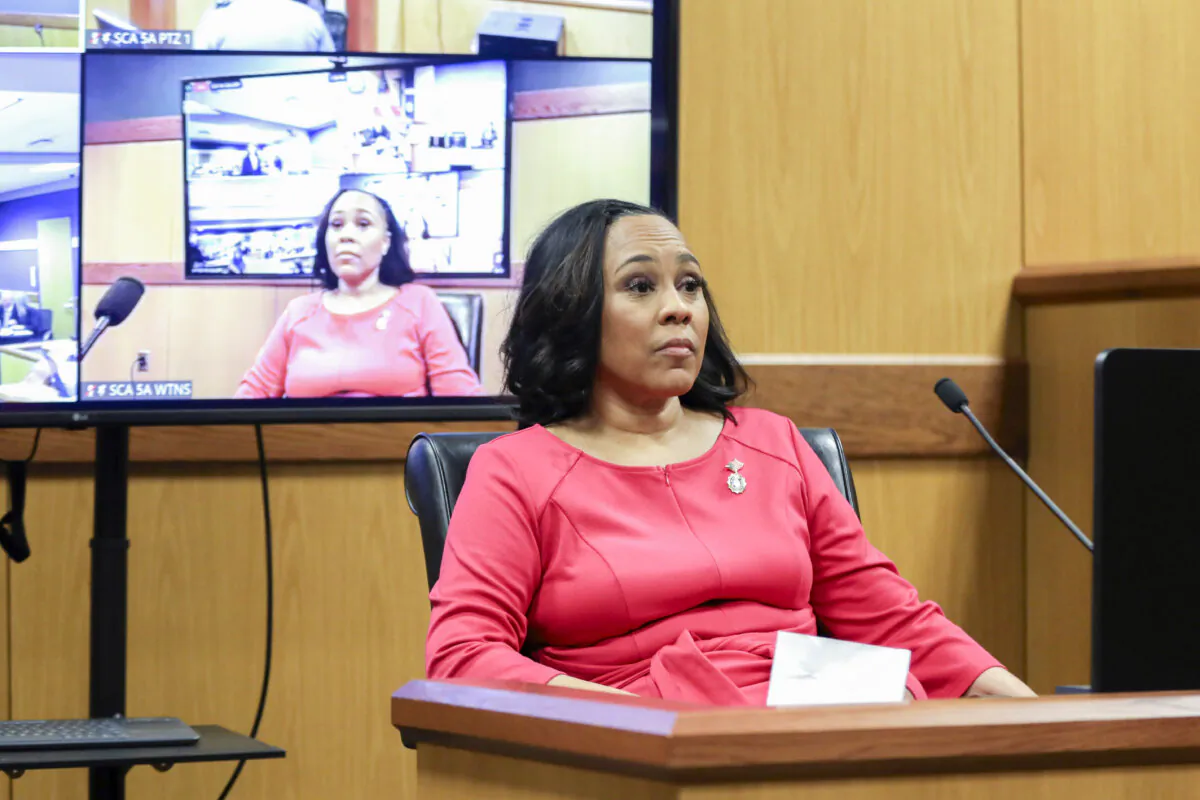Fulton County District Attorney Fani Willis takes the stand as a witness during a hearing in the case of the State of Georgia v. Donald J. Trump at the Fulton County Courthouse in Atlanta, Ga., on Feb. 15, 2024. (Alyssa Pointer-Pool/Getty Images)