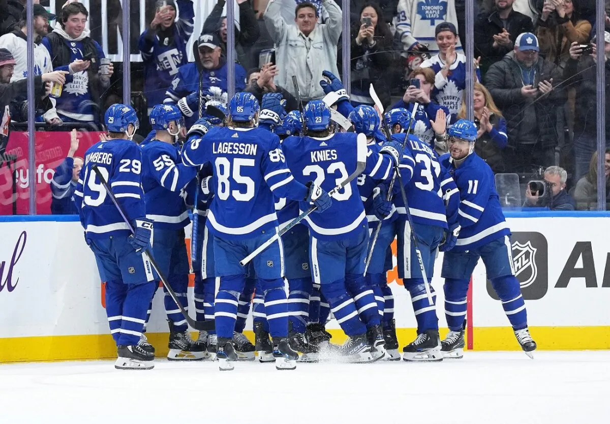 The Toronto Maple Leafs players celebrate the win after right wing William Nylander (88) (not pictured) scored the winning goal against the Philadelphia Flyers during the overtime period at Scotiabank Arena in Toronto on Feb. 15, 2024. (Nick Turchiaro/USA TODAY Sports via Reuters)
