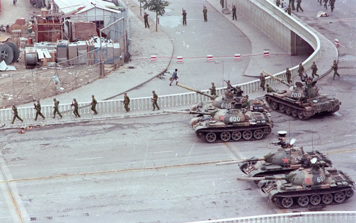 Tanks sit in a street in Beijing two days after the suppression of the pro-democracy protests in Tiananmen Square.   (Photo by David Turnley/Getty Images)