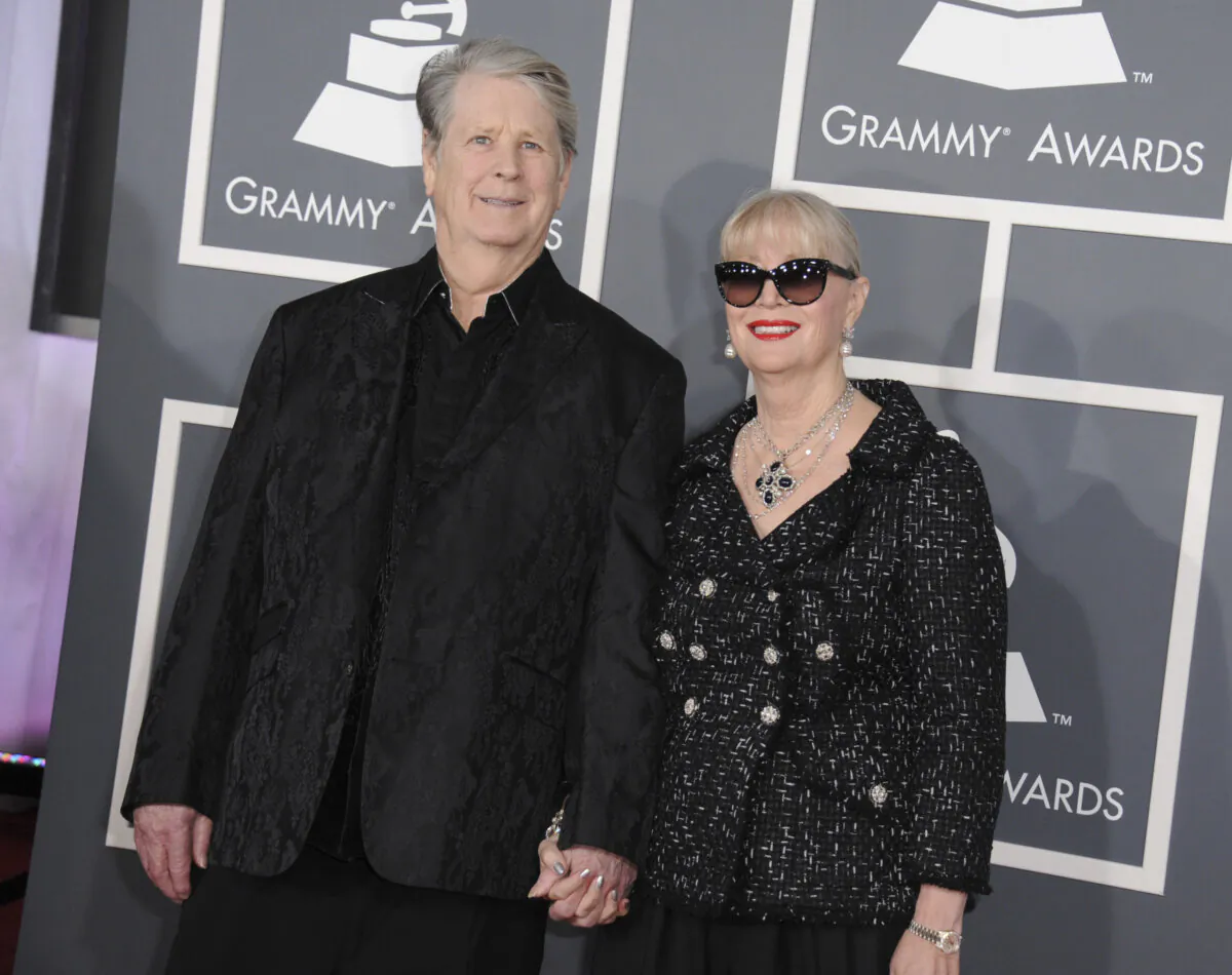 Musician Brian Wilson (L) and his wife Melinda Ledbetter Wilson arrive at the 55th annual Grammy Awards in Los Angeles on Feb. 10, 2013. (Jordan Strauss/Invision/AP)