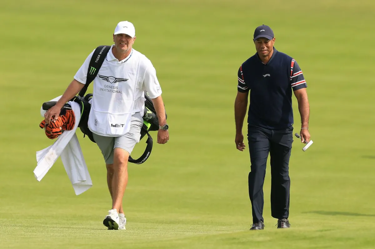 Tiger Woods of the United States and his caddie Lance Bennett walk the second hole during the second round of The Genesis Invitational at Riviera Country Club in Pacific Palisades, Calif., on Feb. 16, 2024. (Sean M. Haffey/Getty Images)
