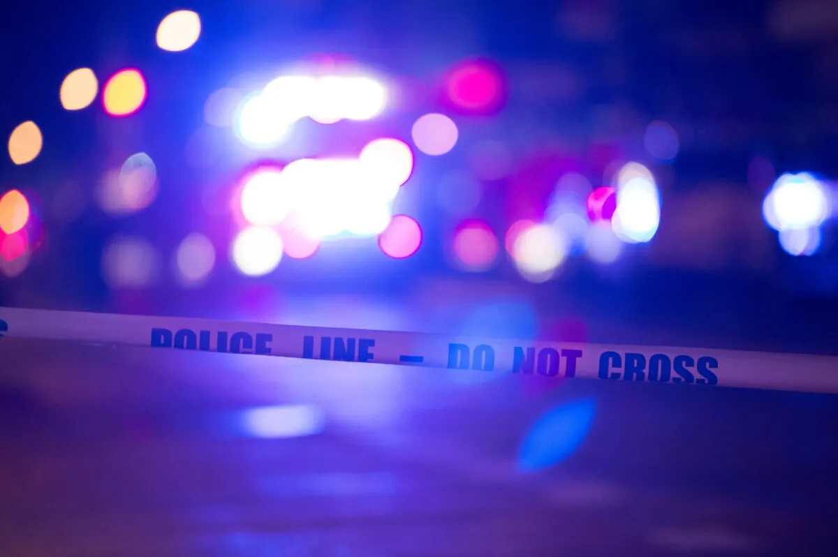 Police tape on a blocked off road in a file image. (Bryan R. Smith/AFP via Getty Images)