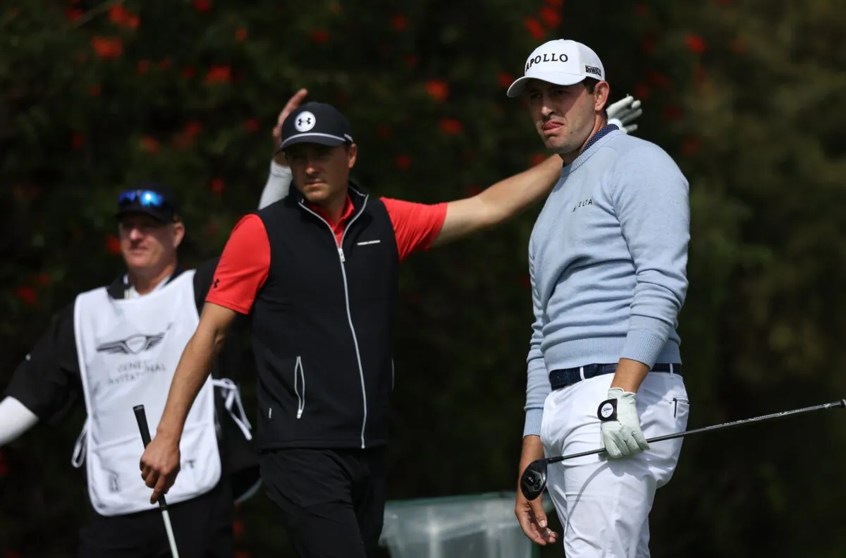 Patrick Cantlay of the United States reacts to his tee shot on the fourth hole as Jordan Spieth of the United States looks on during the second round of The Genesis Invitational at Riviera Country Club in Pacific Palisades, Calif., on Feb. 16, 2024 (Harry How/Getty Images)