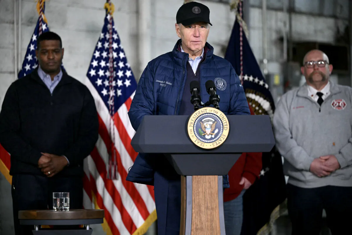 President Joe Biden (C) speaks after receiving an operational briefing from officials on the continuing response and recovery efforts at the site of a train derailment which spilled hazardous chemicals a year ago in East Palestine, Ohio, on Feb. 16, 2024. (Mandel Ngan/AFP via Getty Images)