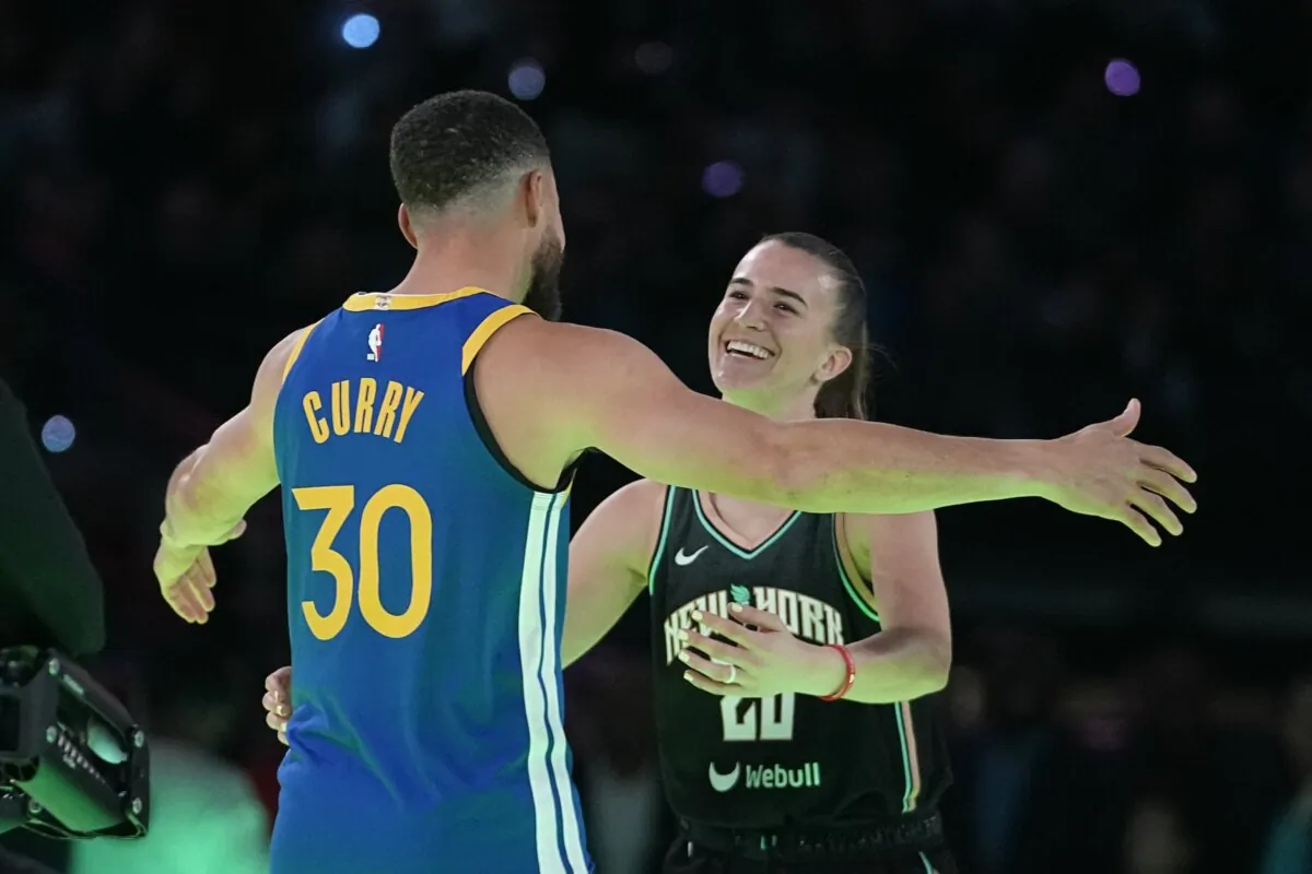 Sabrina Ionescu (R) and Stephen Curry are representing the U.S. women's and men's Olympic basketball teams, respectively, some six months after their riveting 3-point shooting contest during NBA All-Star Weekend in Indianapolis on Feb. 17, 2024. (Darron Cummings/AP Photo)