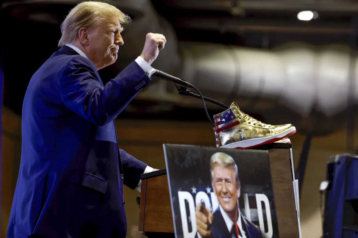 Republican presidential candidate and former President Donald Trump takes the stage to introduce a new line of signature shoes at Sneaker Con at the Philadelphia Convention Center in Philadelphia on Feb. 17, 2024. (Chip Somodevilla/Getty Images)