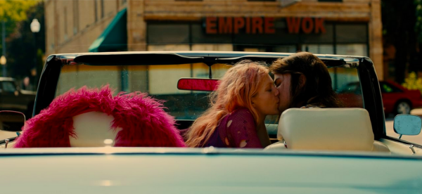 boy and girl kiss in car in MARMALADE