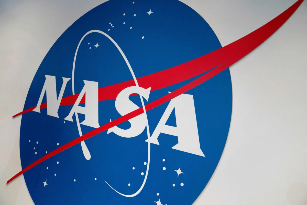 The NASA logo is displayed at the Earth Information Center exhibit at NASA headquarters in Washington on June 21, 2023. (Stefani Reynolds/AFP via Getty Images)