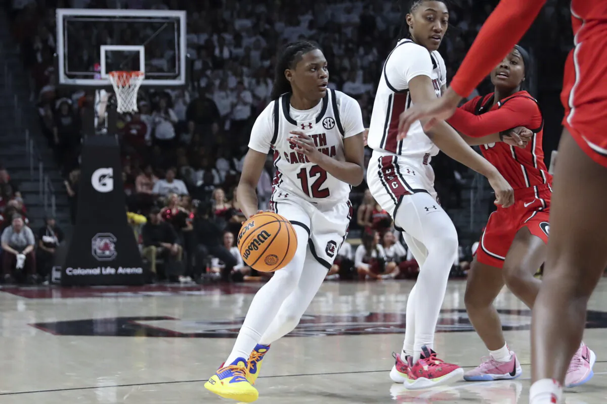 South Carolina guard MiLaysia Fulwiley (12) looks for a path to the basket during the second half of an NCAA college basketball game against Georgia in Columbia, S.C., on Feb. 18, 2024. (Artie Walker Jr./AP Photo)