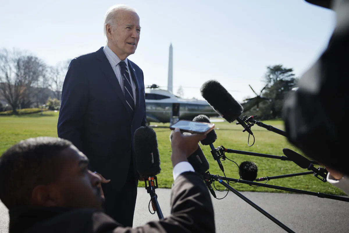President Joe Biden talks briefly with reporters after returning to the White House on Feb. 19, 2024. (Chip Somodevilla/Getty Images)
