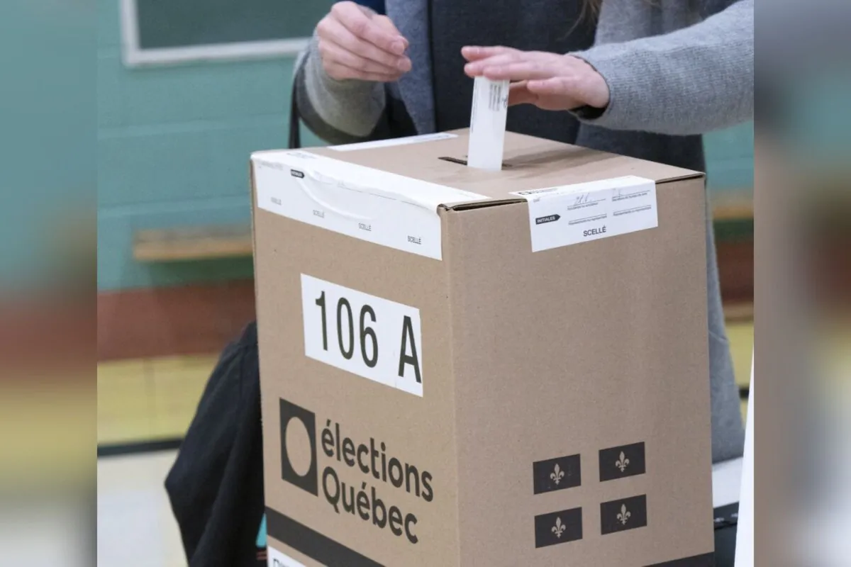 A voter casts their ballot in the Quebec provincial election, in Montreal, on Oct. 3, 2022. (The Canadian Press/Ryan Remiorz)