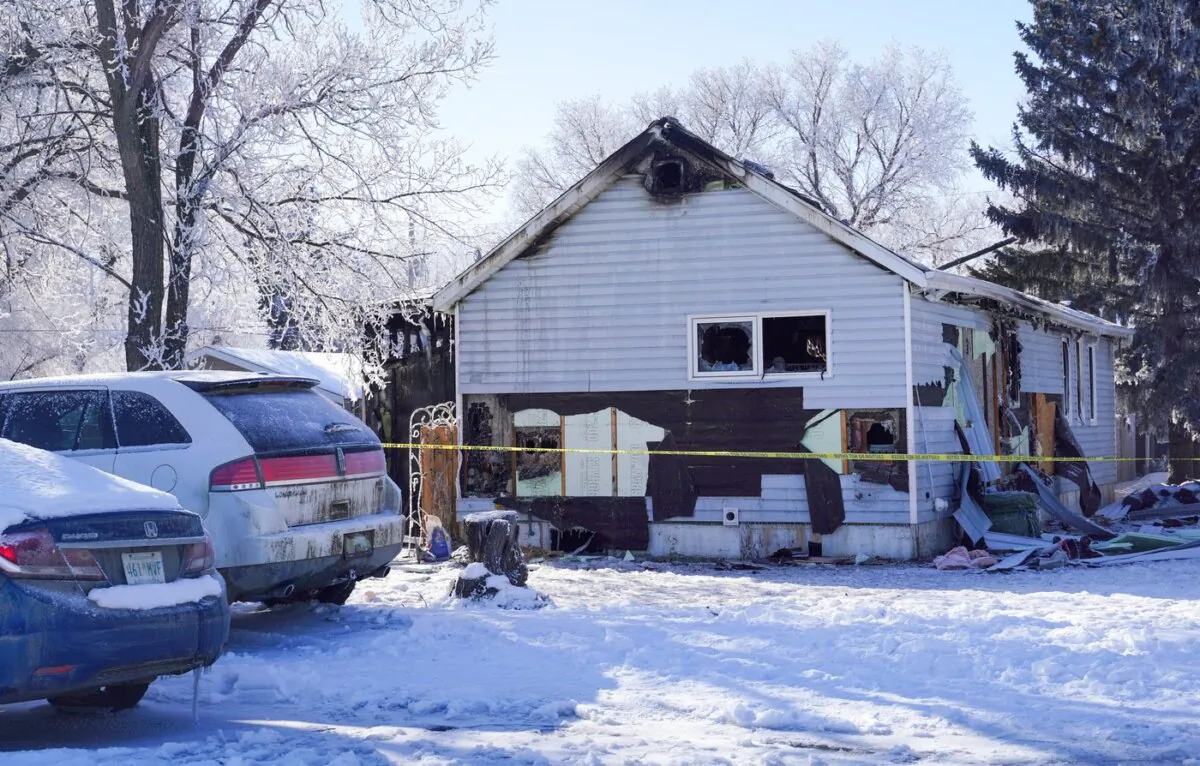 The scene of a house fire that happened Sunday on Ottawa Street in Davidson, Sask., on Feb. 19, 2024. (The Canadian Press/Heywood Yu)