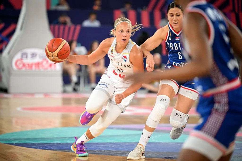Belgium's point guard Julie Allemand (L) dribbles the ball under pressure from Serbia's shooting guard Sasa Cadjo (2R) during the FIBA Women's Eurobasket 2023 quarter-final match between Belgium and Serbia at the Arena Stozice in Ljubljana, on June 22, 2023. (Jure Makovec/AFP via Getty Images)