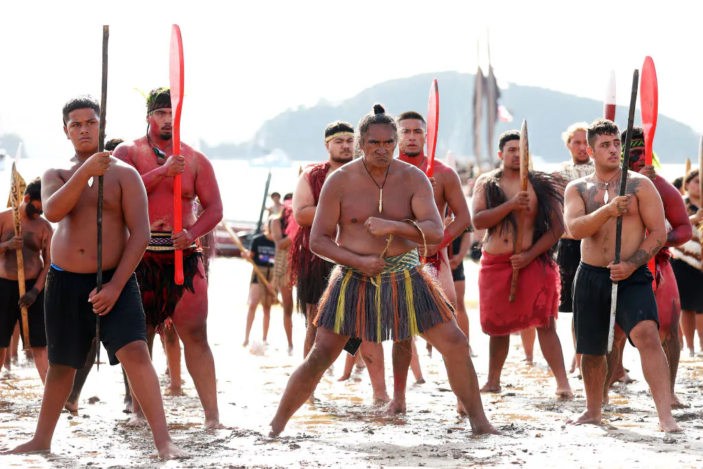 The Waka land on the beach and a haka is performed in Waitangi, New Zealand, on Feb. 6, 2021. (Fiona Goodall/Getty Images)