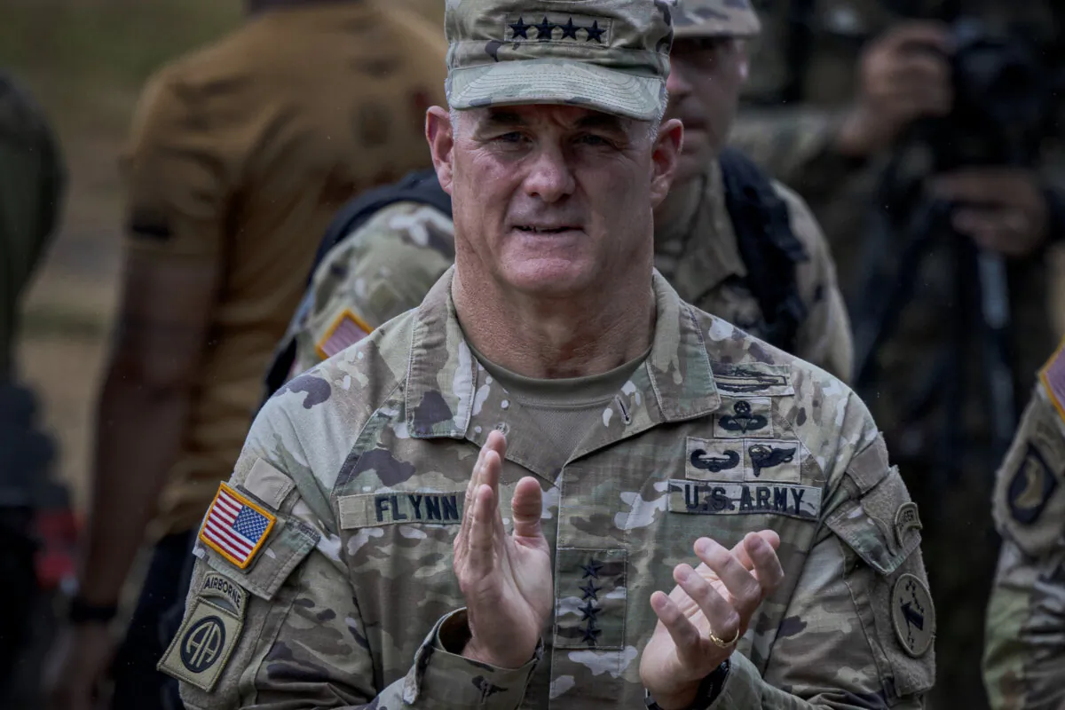 US Army Pacific (USARPAC) Commander Gen. Charles Flynn claps during the 'Balikatan' or 'shoulder-to-shoulder' U.S.-Philippines joint military exercises in Fort Magsaysay in Nueva Ecija, Philippines, on April 13, 2023. (Ezra Acayan/Getty Images)