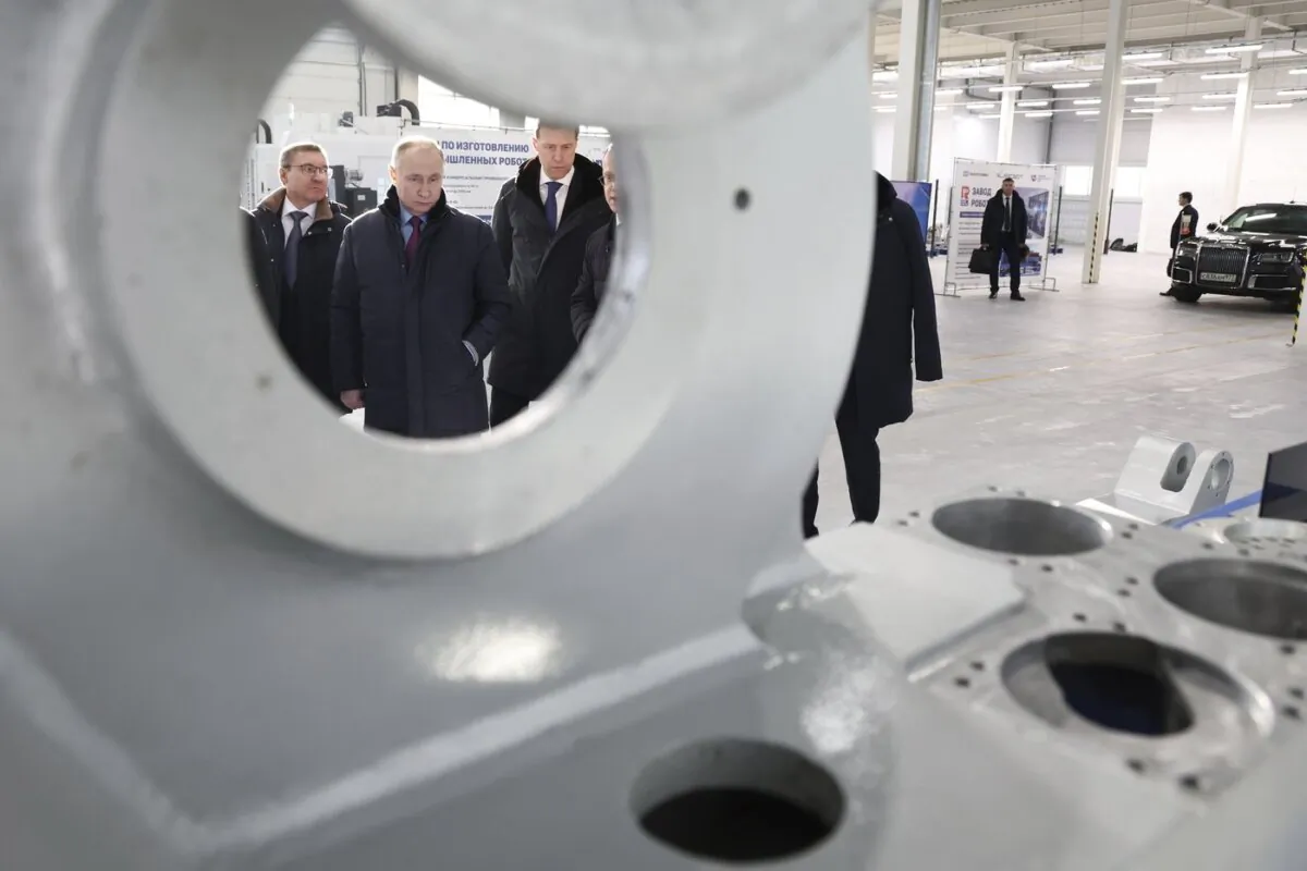 Russian President Vladimir Putin looks at productions of the Chelyabinsk Forge-and-Press Plant in Chelyabinsk, Russia, on Feb. 16, 2024. (The Canadian Press/AP-HO, Kremlin POOL, Sputnik, Alexander Kazakov)