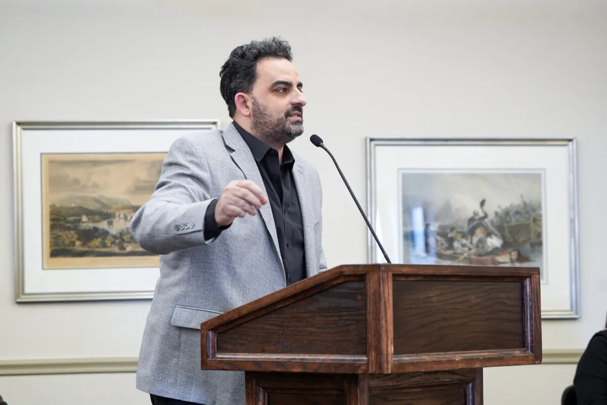 Cornwall resident and small business owner Gregg Paliotta spoke against the congestion toll at a public forum hosted by Rep. Pat Ryan (D-N.Y.) in Cornwall, N.Y., on Feb. 17, 2024. (Cara Ding/The Epoch Times)
