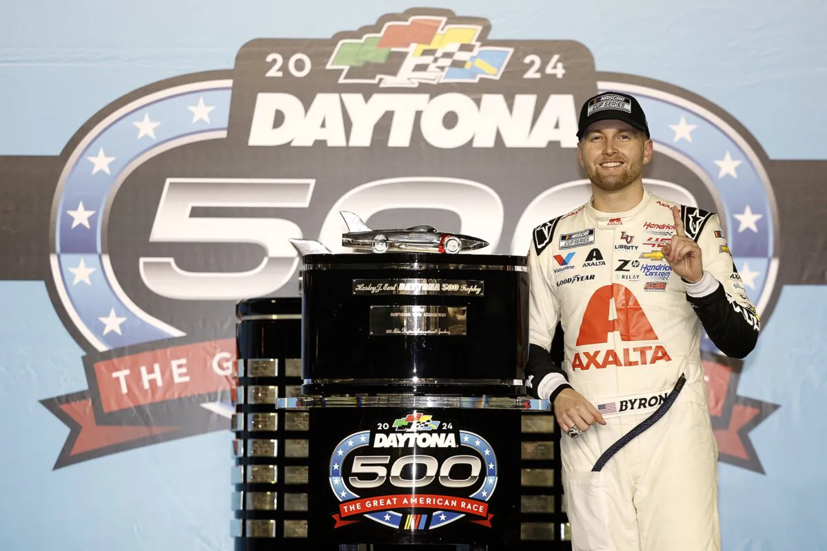 William Byron, driver of the (24) Axalta Chevrolet, celebrates in victory lane after winning the NASCAR Cup Series Daytona 500 in Daytona Beach, Fla., on Feb. 19, 2024. (James Gilbert/Getty Images)