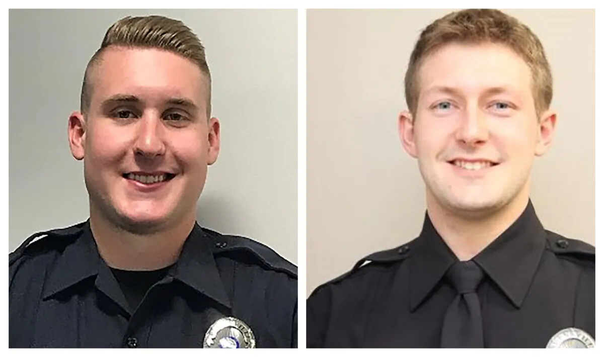 Burnsville police officers Matthew Ruge (R) and Paul Elmstrand in an undated photo. (City of Burnsville via AP)