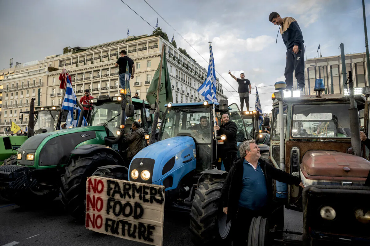 Greek farmers take part in a protest to demand financial aid in front of the Parliament in Athens on Feb. 20, 2024. (Angelos Tzortzinis/AFP via Getty Images)