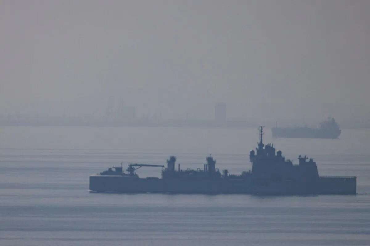 A ship, believed to be the French Navy's FS Jacques Chevalier (A725) heads toward the Bab el-Mandeb Strait in Tadjoura, Djibouti, on Jan. 20, 2024. (Luke Dray/Getty Images)