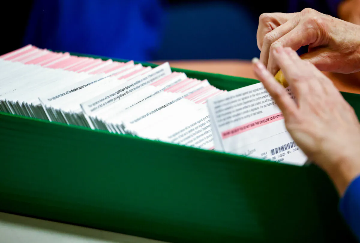 Ballots are processed by an election worker at the Clark County Election Department in North Las Vegas, Nev., on Nov. 10, 2022. (Mario Tama/Getty Images)