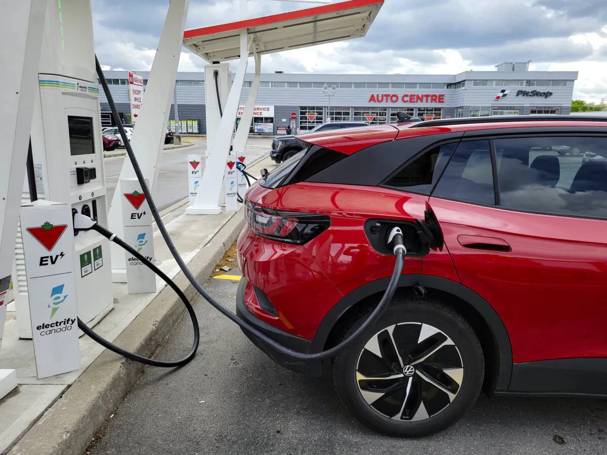 An electric car at a Canadian Tire charging station in Scarborough, Ont., on June 14, 2023. (The Canadian Press/Doug Ives)