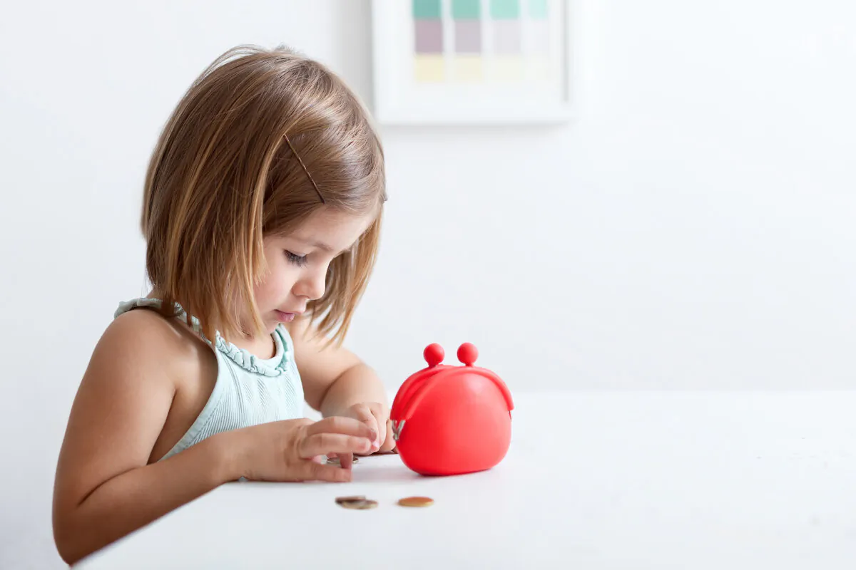 Teach them how to stop and think before making any spending decision. (Sonya Anro/Shutterstock)