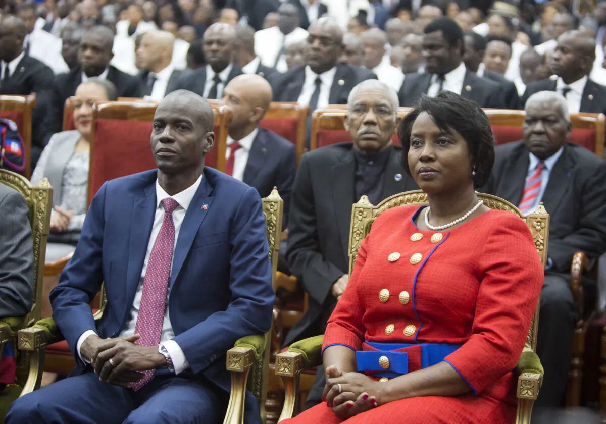 Haiti's President Jovenel Moise sits with his wife Martine during his swearing-in ceremony at Parliament in Port-au-Prince, Haiti, on Feb. 7, 2017. (Dieu Nalio Chery/AP Photo)