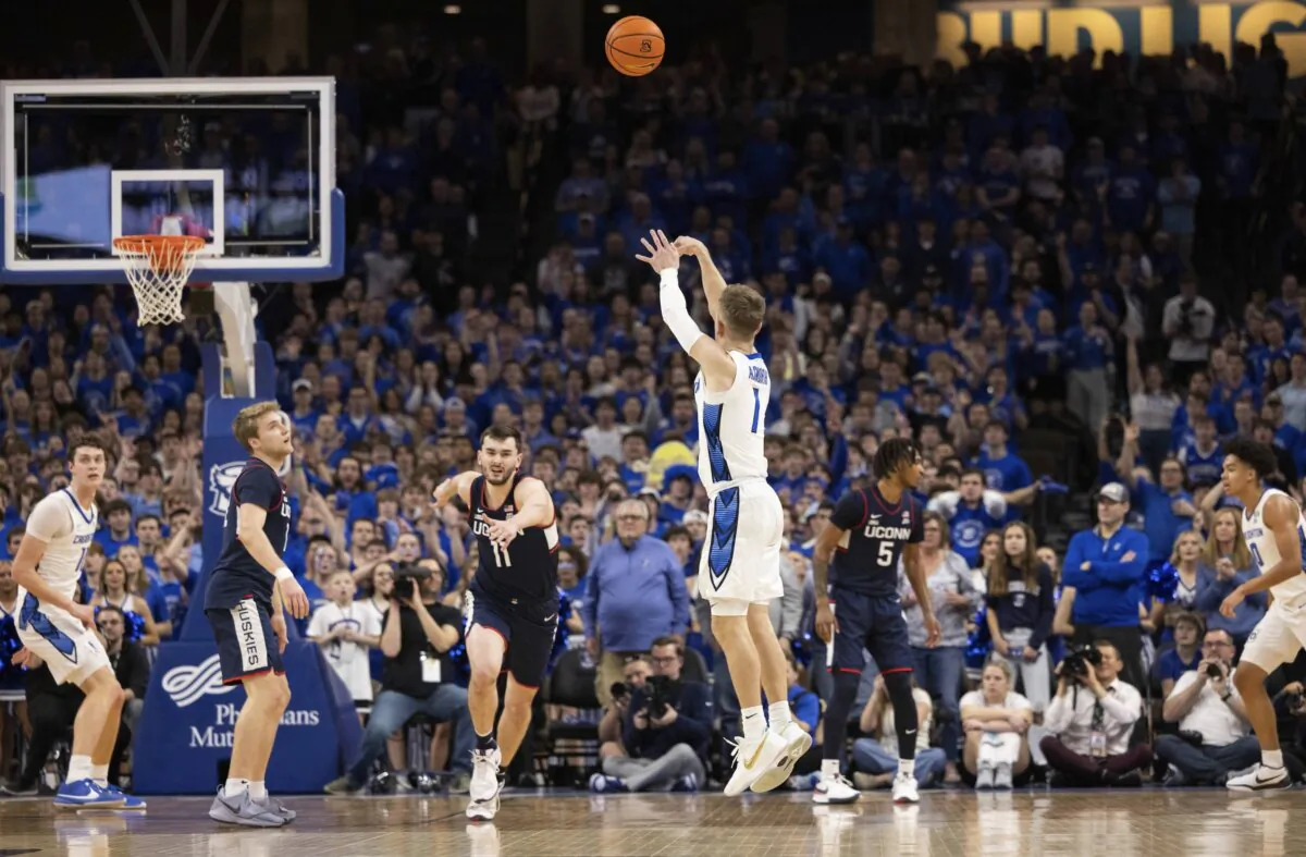 Creighton's Steven Ashworth (1) shoots a 3-pointer against UConn's Alex Karaban (11) during the first half of an NCAA college basketball game in Omaha, Neb., on Feb. 20, 2024. (Rebecca S. Gratz/AP Photo)