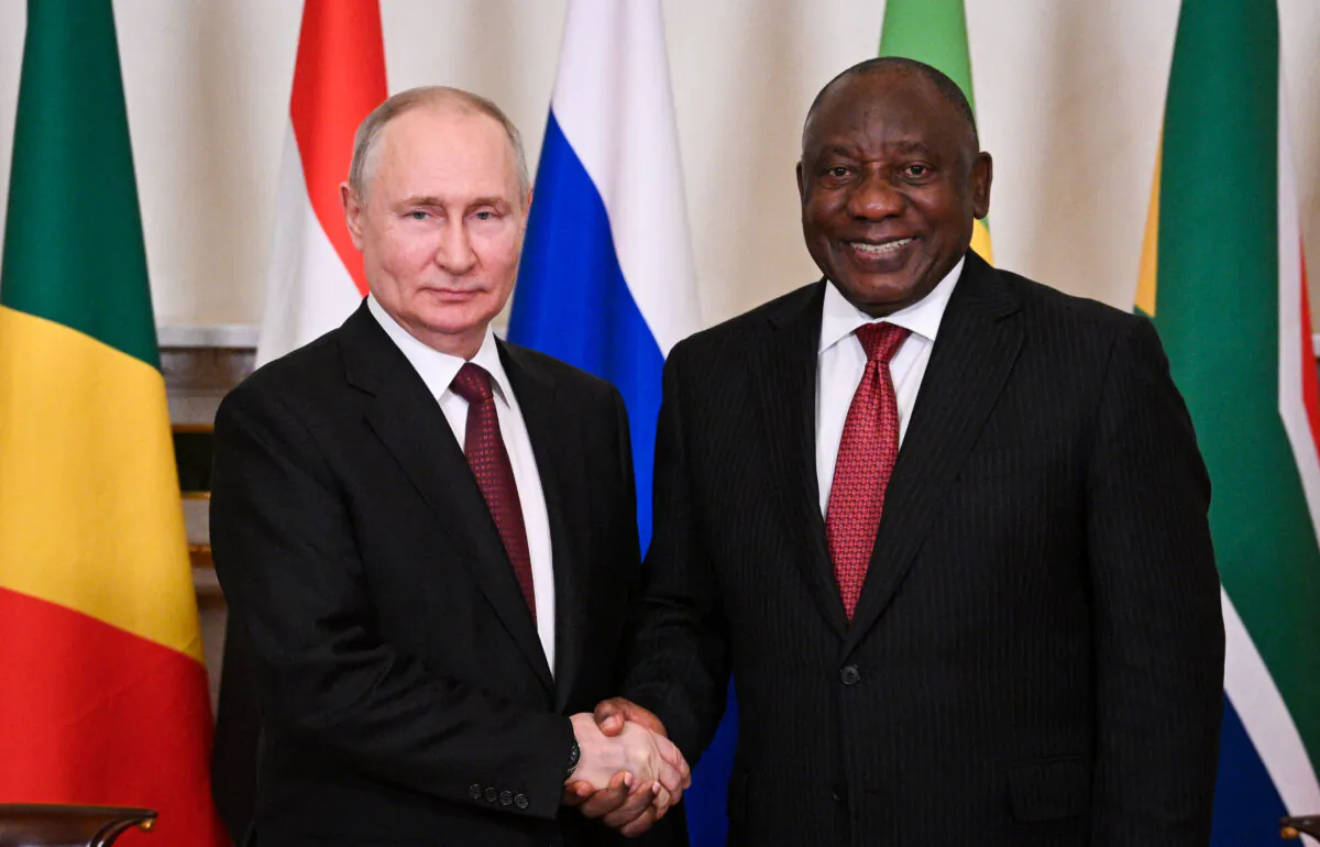 South African President Cyril Ramaphosa (R) meets with Russian President Vladimir Putin ahead of a meeting with African leaders at the Constantine (Konstantinovsky) Palace in Strelna, outside Saint Petersburg on June 19, 2023. (RAMIL SITDIKOV / RIA NOVOSTI / AFP via Getty Images)