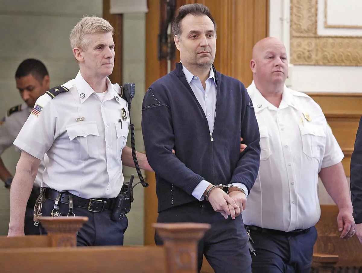 Brian Walshe enters the courtroom for his arraignment in Dedham, Mass., on April 27, 2023. (Greg Derr/The Patriot Ledger via AP, Pool)