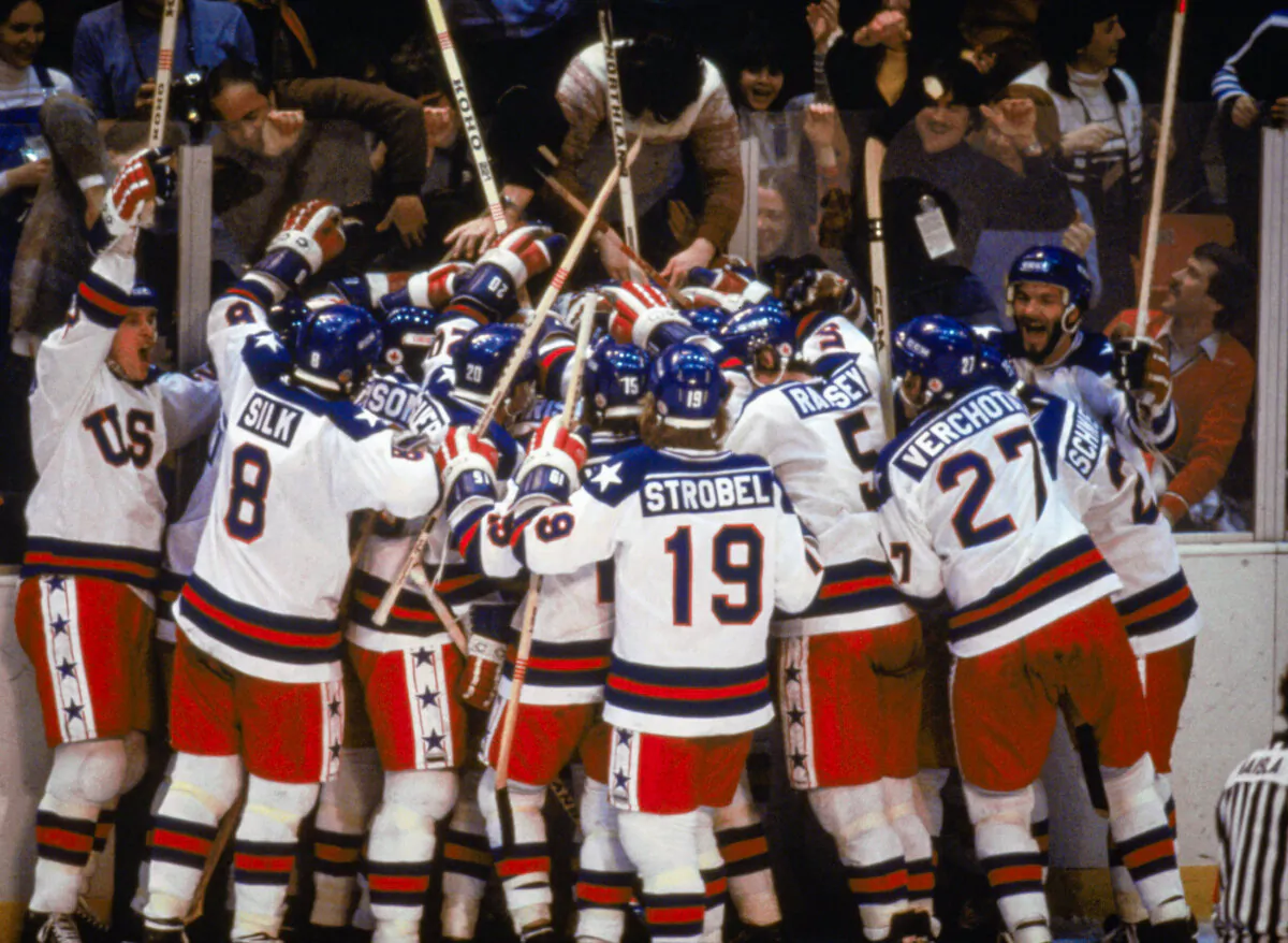 Team USA celebrates their 4-3 victory over the Soviet Union in the semi-final Men's Ice Hockey event at the Winter Olympic Games in Lake Placid, N.Y., on Feb. 22, 1980. The game was dubbed "the Miracle on Ice.” The U.S. went on to win the gold medal by defeating Finland 4-2 in the gold medal game. (Steve Powell /Getty Images)