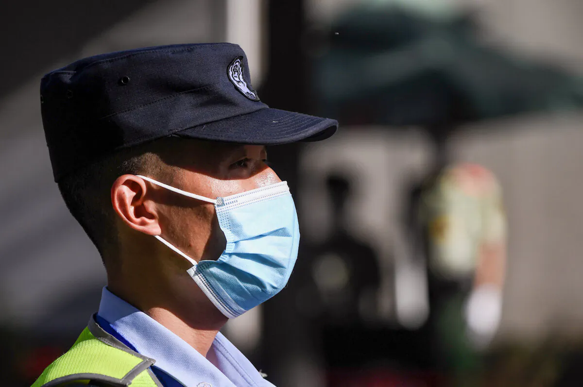 A policeman stands guard in front of the U.S. consulate in Chengdu, southwestern China's Sichuan province, on July 26, 2020. (Noel Celis/AFP via Getty Images)
