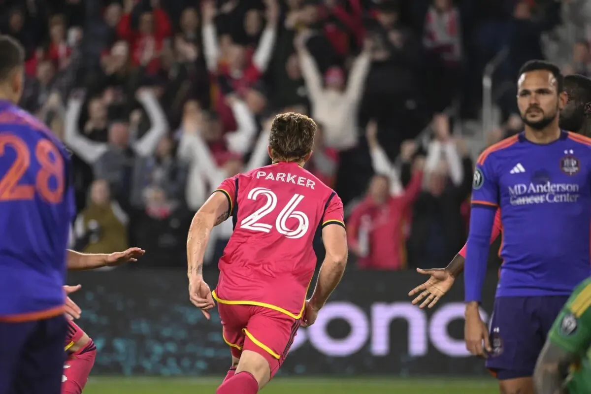 St. Louis City defender Tim Parker (26) reacts after scoring a goal against the Houston Dynamo during the second half of the CONCACAF Champions Cup-Round One at CITYPARK in St. Louis on Feb. 20, 2024. (Joe Puetz/USA TODAY Sports via Field Level Media)