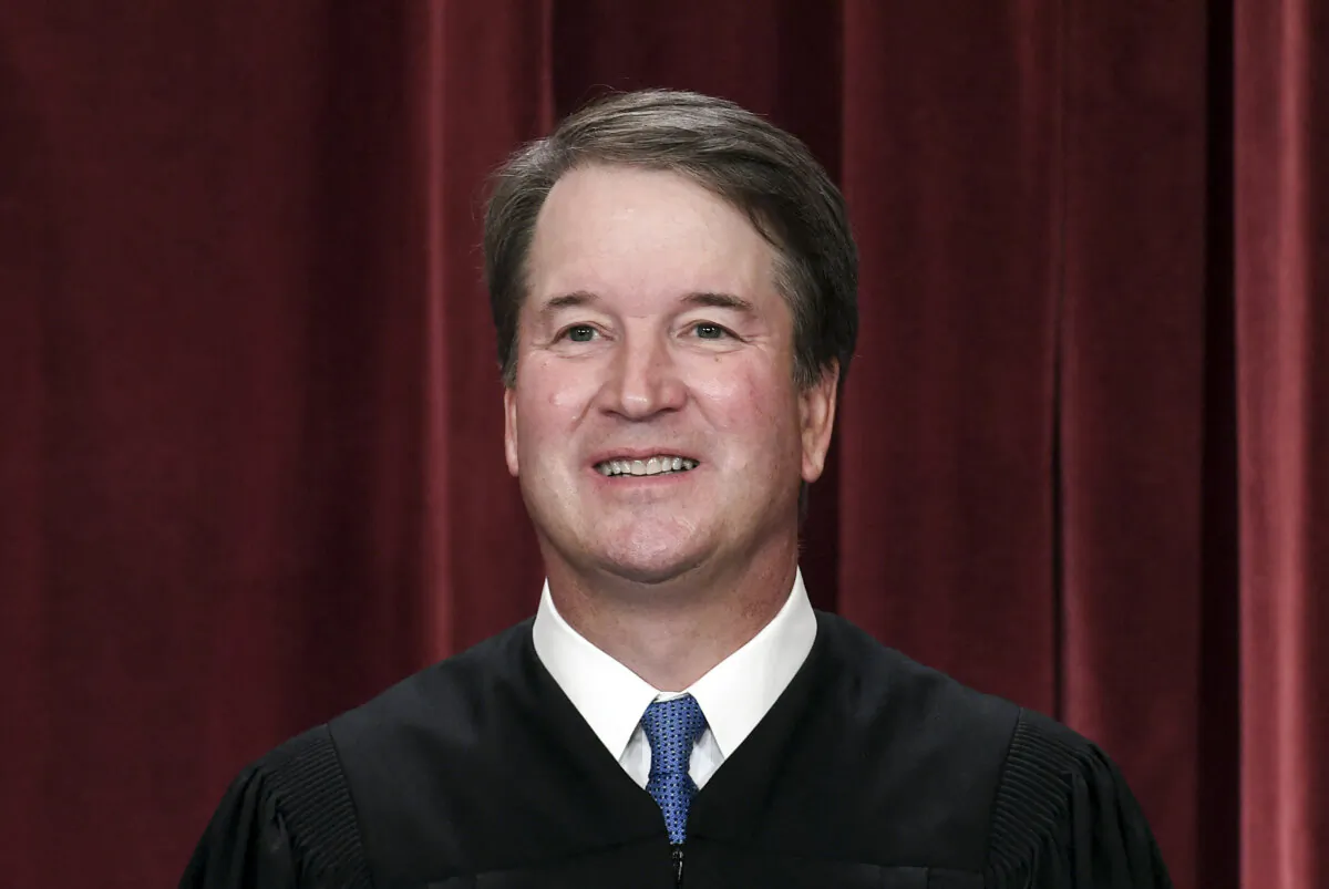Associate Supreme Court Justice Brett Kavanaugh poses for the official photo at the Supreme Court in Washington on Oct. 7, 2022. (Olivier Douliery/AFP via Getty Images)