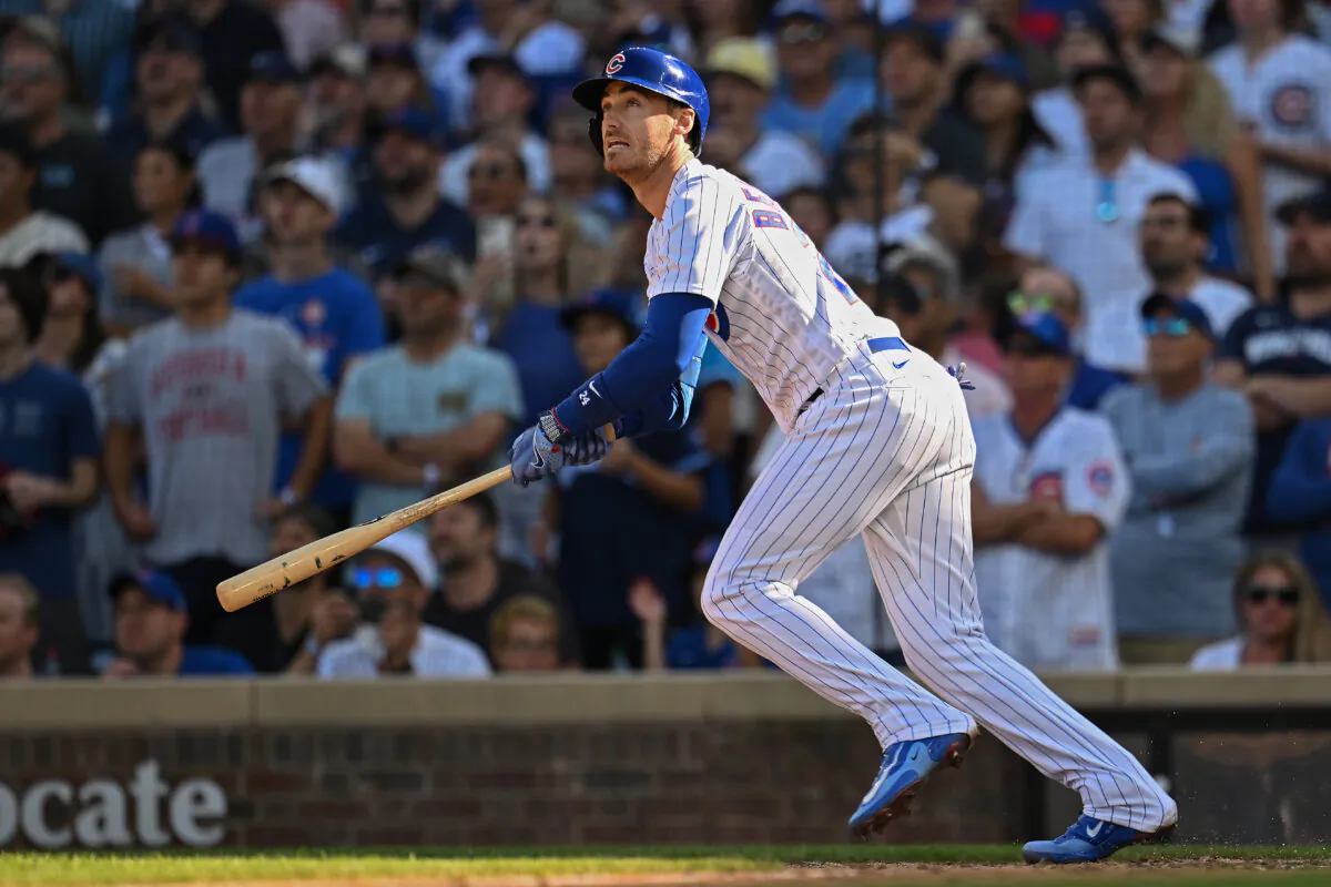 Cody Bellinger (24) of the Chicago Cubs follows his RBI sacrifice fly in the seventh inning against the Colorado Rockies at Wrigley Field in Chicago, Illinois, on Sept. 23, 2023. (Quinn Harris/Getty Images)