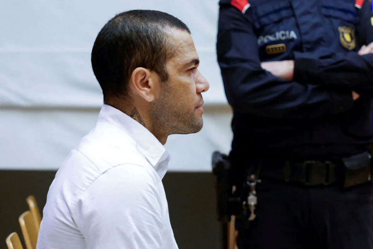 Brazil soccer player Dani Alves sits in court during the first day of his trial in Barcelona, Spain, on Feb. 5, 2024. (Alberto Estevez/Pool via Reuters)