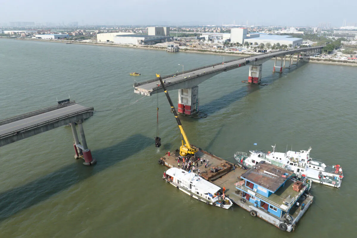 The site where a container ship hit Lixinsha bridge, plunging vehicles into the waters, in Guangzhou, Guangdong Province, China, on Feb. 22, 2024. (China Daily via Reuters)