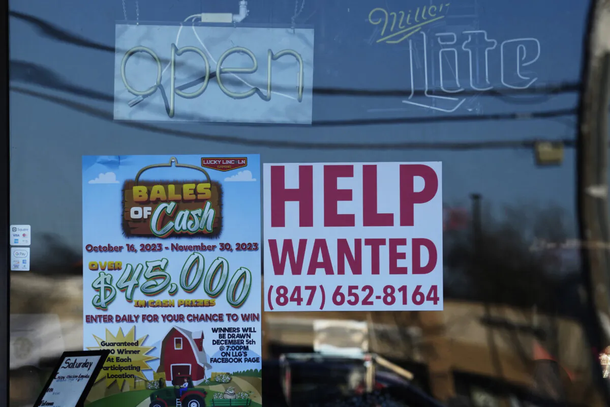 A "Help Wanted" sign is displayed at a restaurant in Buffalo Grove, Ill., on Jan. 18, 2024. (Nam Y. Huh/AP Photo)