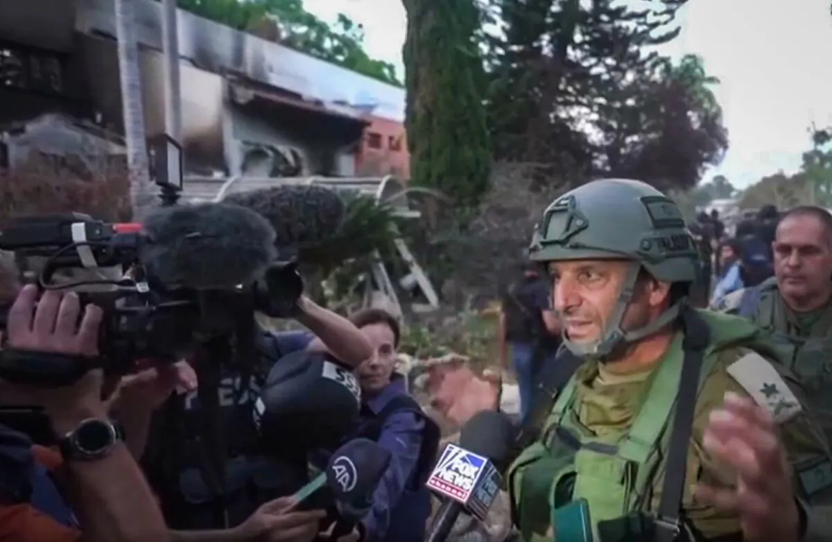 Maj. Gen. Itai Veruv of the Israel Defense Forces speaks to journalists at a kibbutz in Be’eri, Israel, on Oct. 11, 2023. (AP/Screenshot via NTD)